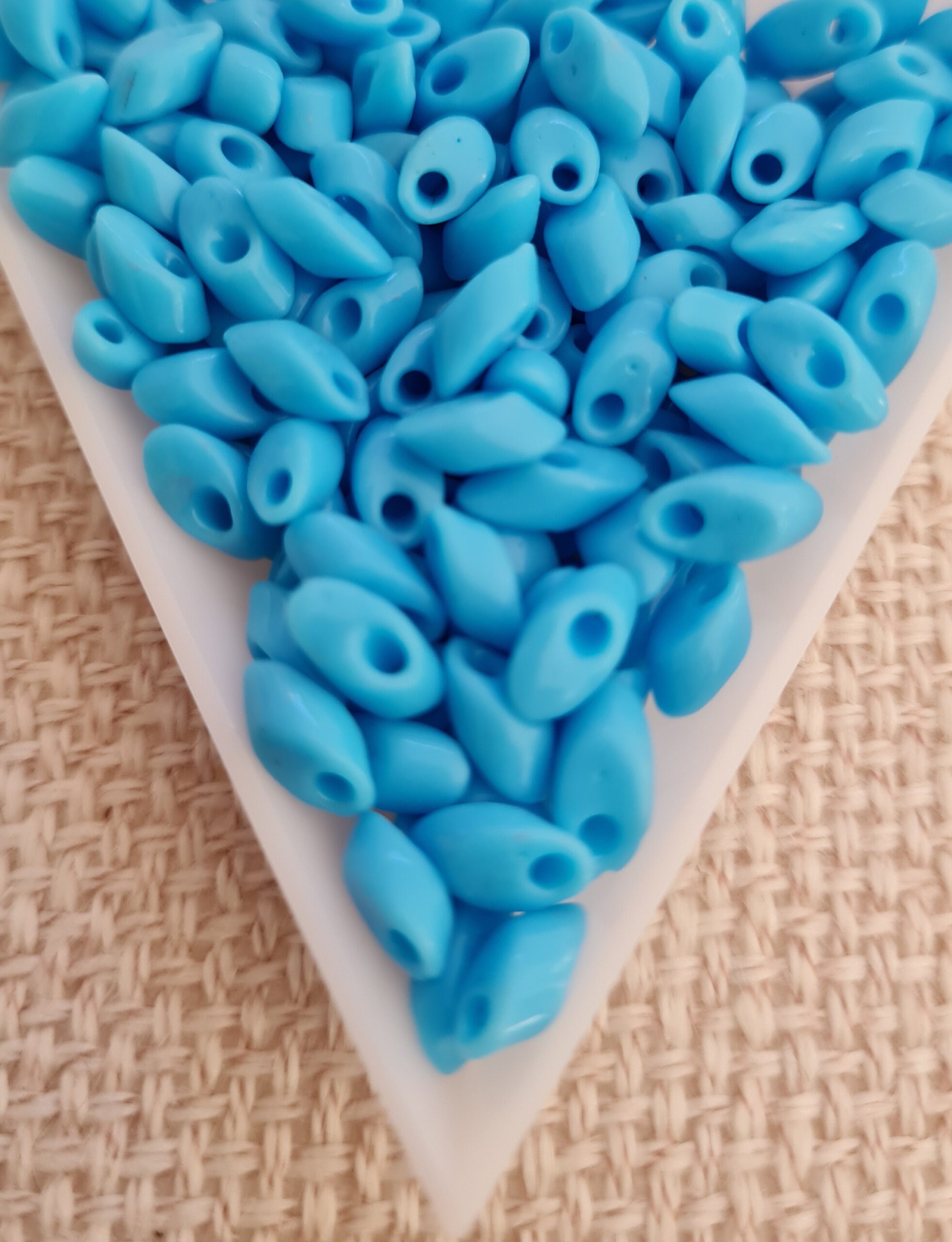 Long Magatama 4x7mm, Opaque Turquoise Blue, 5gms